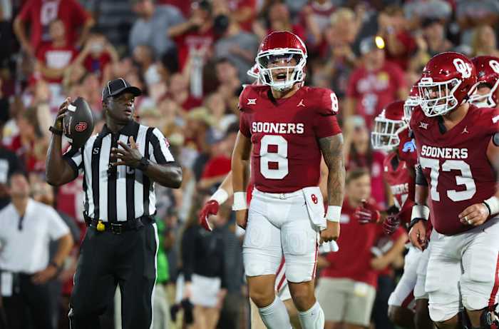 Oklahoma Sooners quarterback Dillon Gabriel (8) celebrates with teammates after scoring a touchdown during the first half against the Iowa State Cyclones at Gaylord Family-Oklahoma Memorial Stadium.